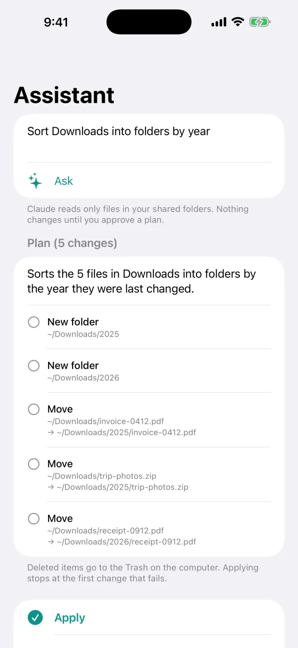 Assistant plan screen: five changes that move files in Downloads into folders by year, with an Apply button